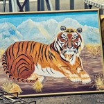 depressing cross-eyed tiger painting