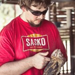 chris over-loving a barn owl
