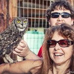 my mom and brother with Napoleon the spotted eagle owl